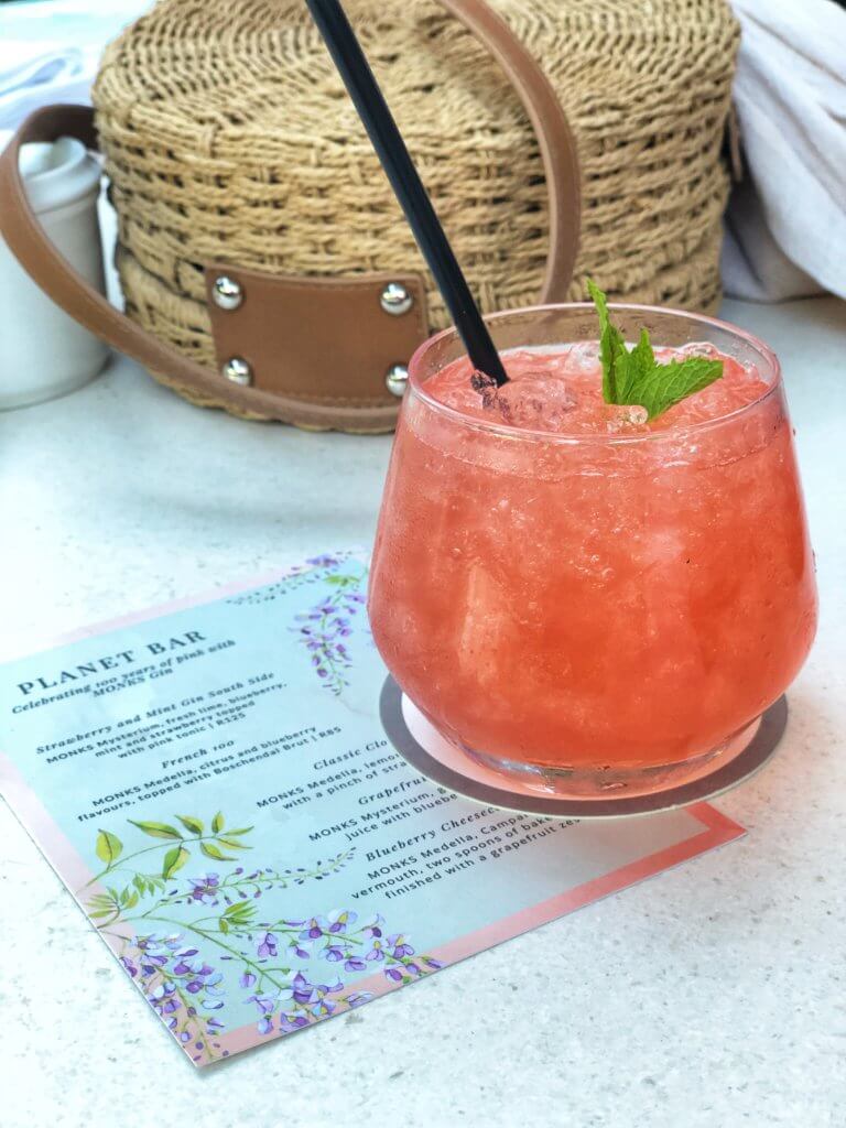 Summer cocktail at Planet Bar. Find out why attending The Blonde Abroad photography tour is a once-in-a-lifetime experience you shouldn't miss. And for more travel tips and wanderlust inspiration, follow The Scenic Suitcase on Pinterest!