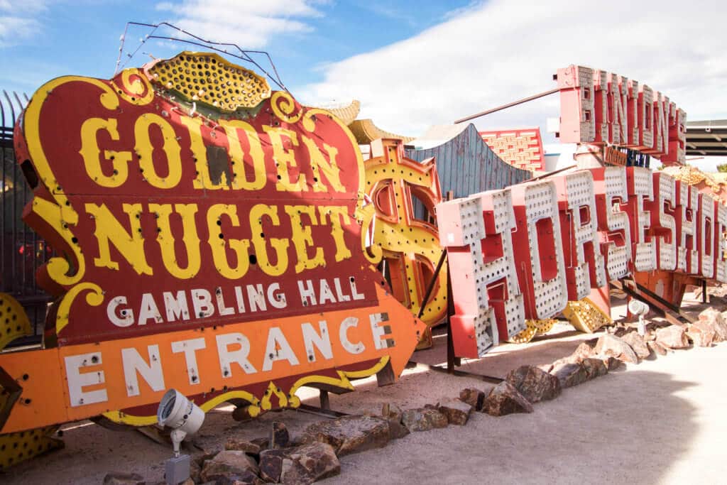 Vintage neon signs for the Golden Nugget and the Horseshoe. Visiting the Neon Boneyard is a must when you're in Las Vegas. Discover the rich history behind these Sin City icons, and what you need to know before you go! And for more travel tips and wanderlust inspiration, follow The Scenic Suitcase on Pinterest!