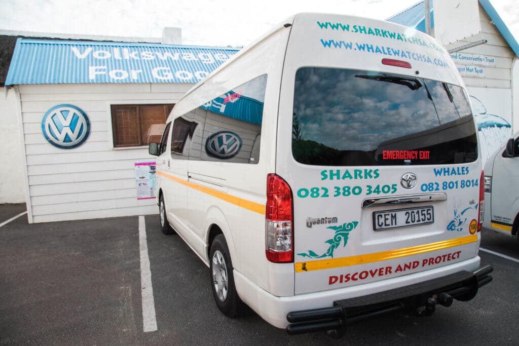 Transport van for shark diving. Find out what it's like to go cage diving with great white sharks in South Africa! What to expect, what not to fear, and what company is the best to book your adventure with. And for more travel tips and wanderlust inspiration follow The Scenic Suitcase on Pinterest!