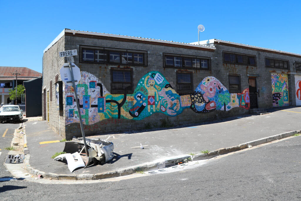 Brightly colored graffiti. Discover the unique street art of Woodstock in South Africa. Find out the history behind this eclectic district and why it's a must on any visit to Cape Town! And for more travel tips and wanderlust inspiration follow The Scenic Suitcase on Pinterest!