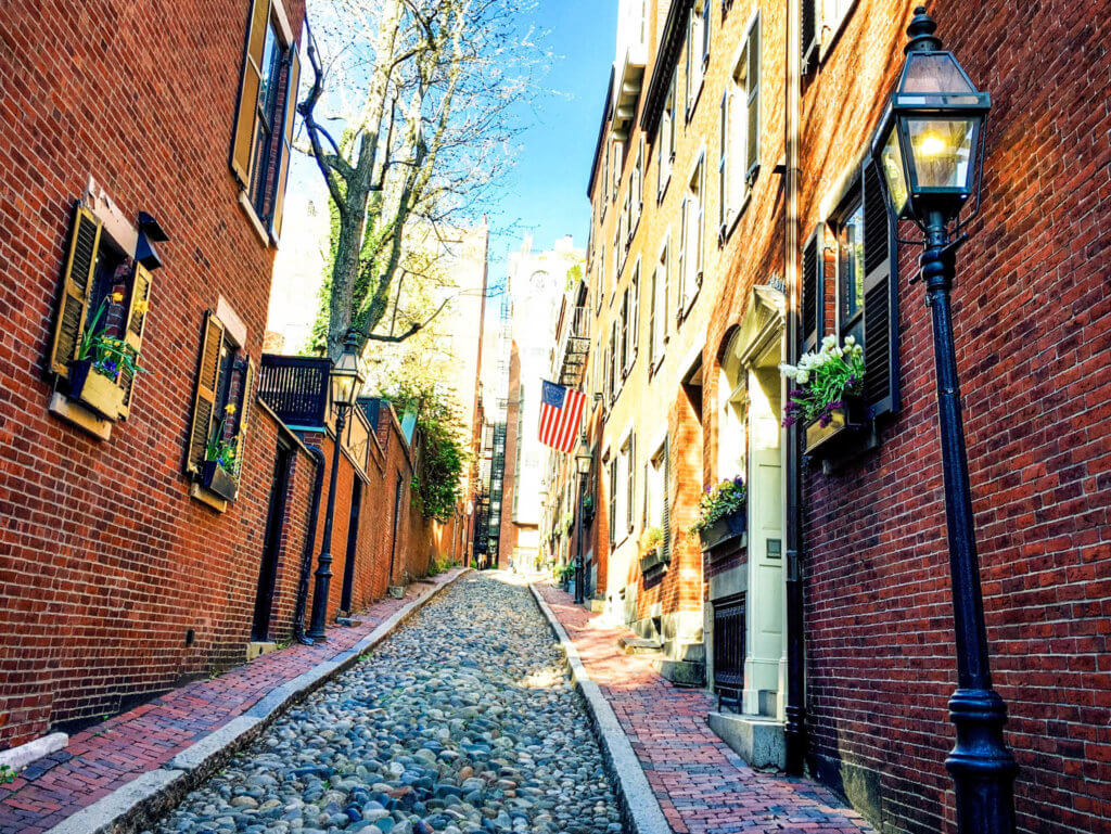 The cobblestones, brick sidewalk, and street lamps of Acorn Street in Boston. Whether it's the Statue of Liberty, Washington DC, or a quaint hometown parade, these americana images capture the essence of the good ol' U.S.A. And for more travel tips and wanderlust inspiration, follow The Scenic Suitcase on Pinterest!