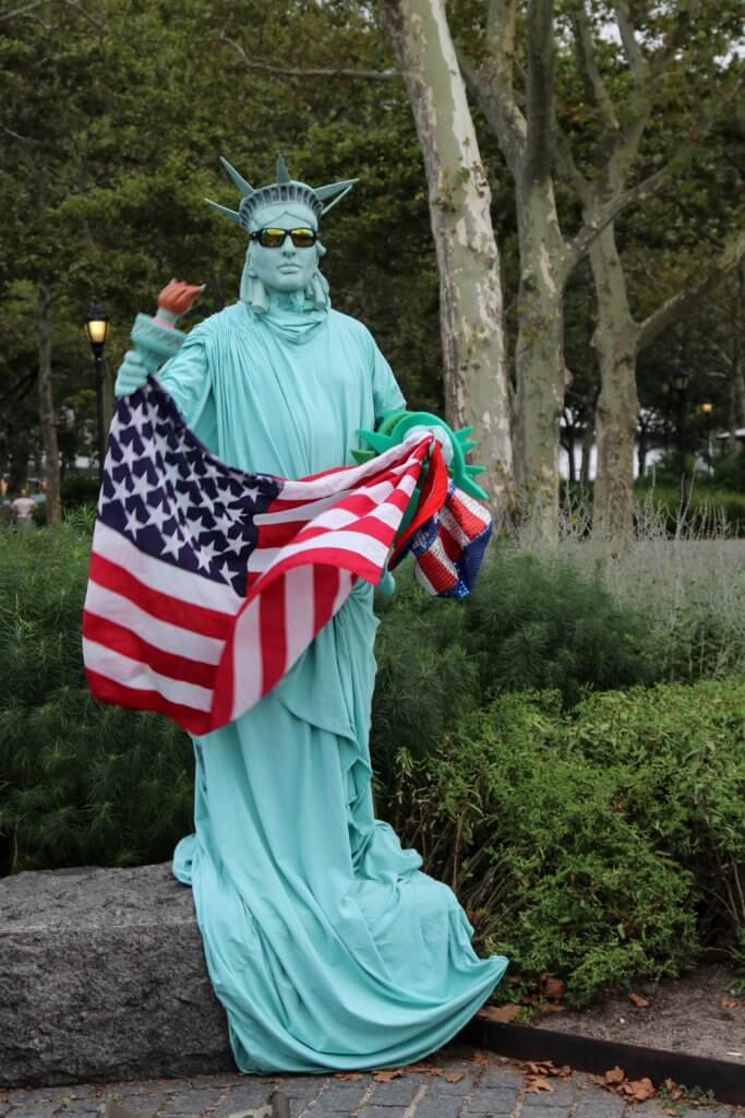 A street performer dressed as the Statue of Liberty holding an American Flag in New York City. Whether it's the Statue of Liberty, Washington DC, or a quaint hometown parade, these americana images capture the essence of the good ol' U.S.A. And for more travel tips and wanderlust inspiration, follow The Scenic Suitcase on Pinterest!