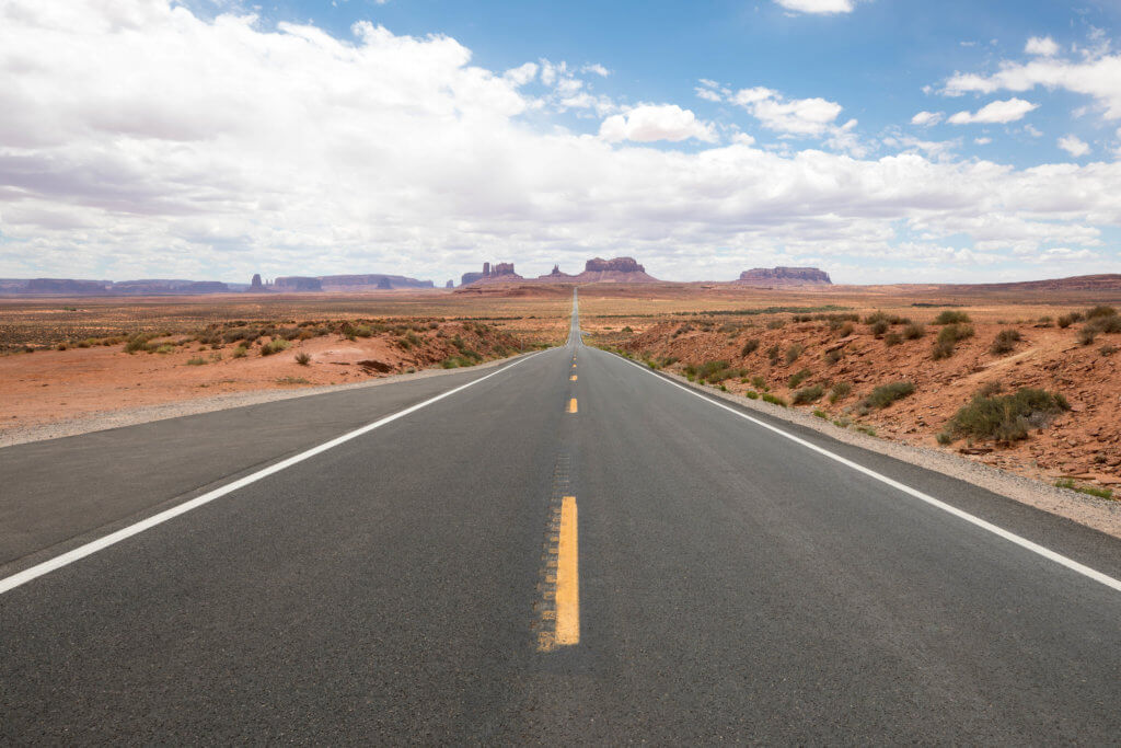 A road towards Monument Valley. Whether it's the Statue of Liberty, Washington DC, or a quaint hometown parade, these americana images capture the essence of the good ol' U.S.A. And for more travel tips and wanderlust inspiration, follow The Scenic Suitcase on Pinterest!