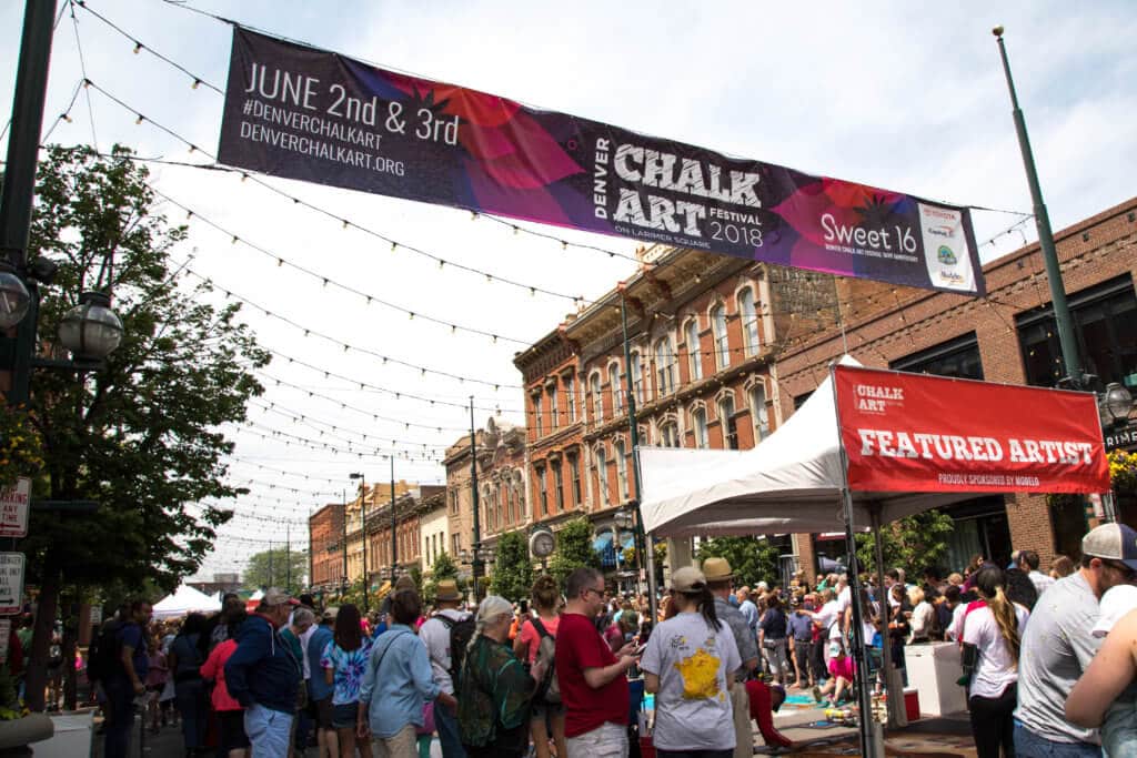 A crowded street and lots of event onlookers. Find out everything you need to know about the annual Denver Chalk Art Festival! What it's all about, what you can expect, and what you can't miss! And for more travel tips and wanderlust inspiration, follow The Scenic Suitcase on Pinterest!