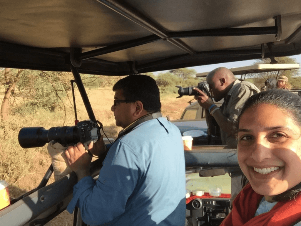 Naveen and Shaylee on safari in Africa. Discover the next best thing in travel - Next Vacay! Learn about the program that's delivering ridiculously cheap deals and making travel accessible to all! And for more travel tips and wanderlust inspiration, follow The Scenic Suitcase on Pinterest!