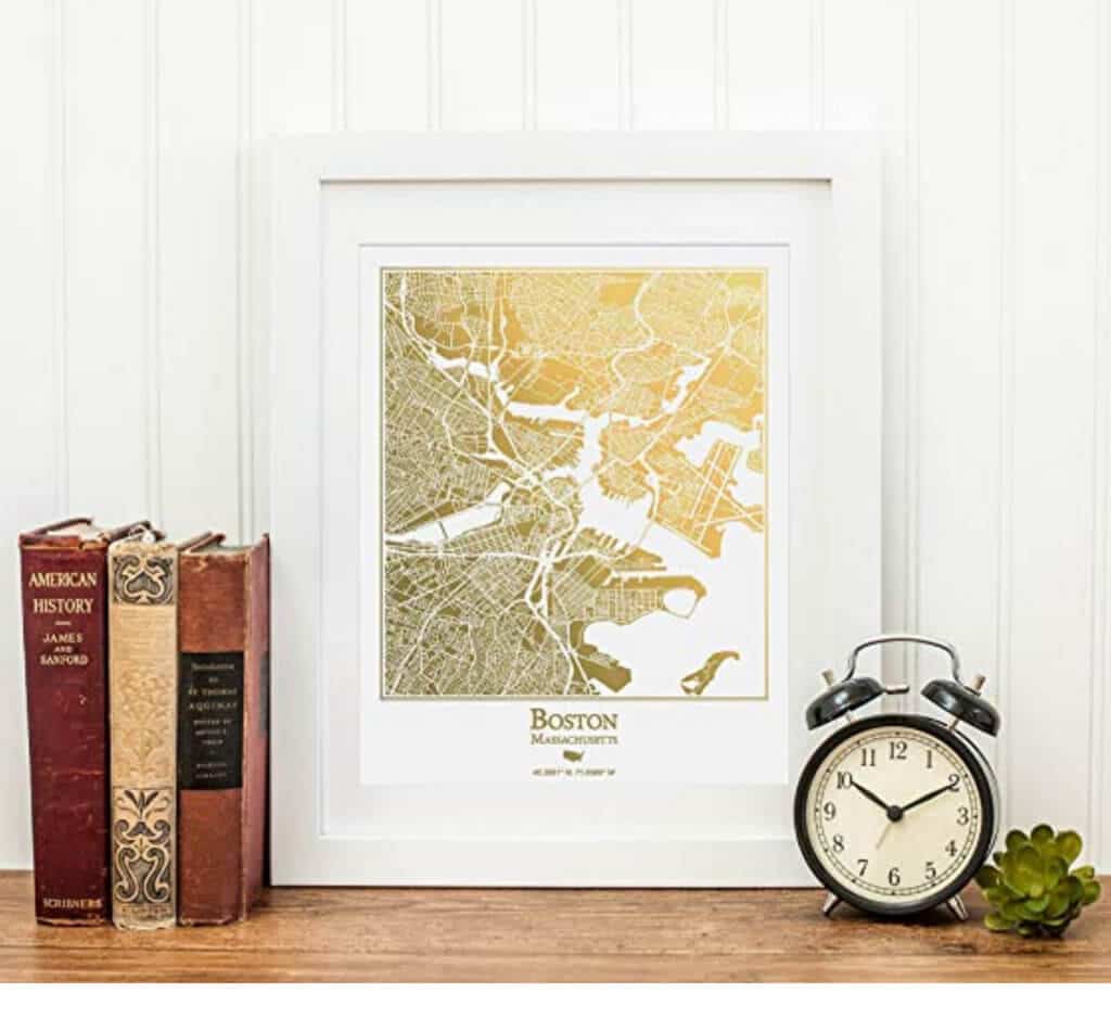 A gold foil map of Boston in a white frame beside books and a clock. Stylish, afforable, and fun travel inspired home decor that's perfect for anyone with a serious case of wanderlust. Find that perfect accent for your home! And for more travel tips and wanderlust inspiration, follow The Scenic Suitcase on Pinterest!