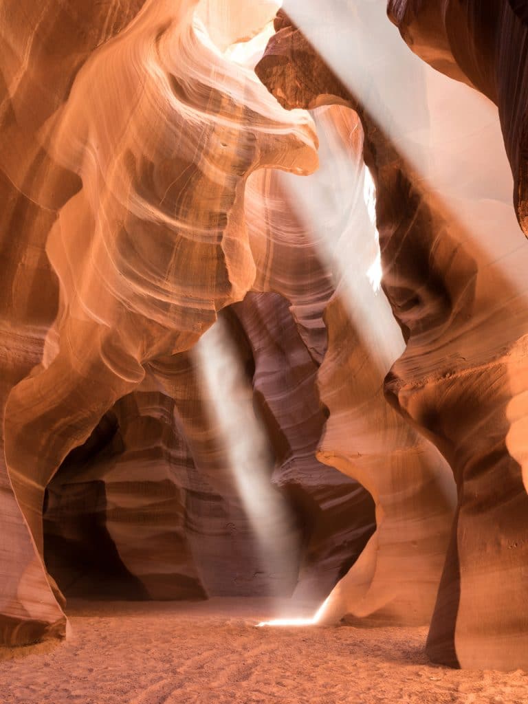 Light beams in Antelope Canyon. See the most picture perfect moments of 2018. From London to Cape Town to Las Vegas and more, see what you can't miss in these incredible destinations! And for more travel tips and wanderlust inspiration, follow The Scenic Suitcase on Pinterest!