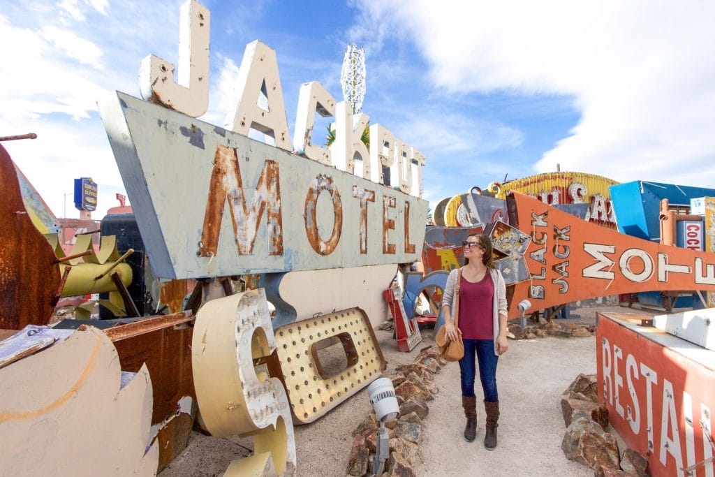 Girl walking past signs at the Neon Museum.See the most picture perfect moments of 2018. From London to Cape Town to Las Vegas and more, see what you can't miss in these incredible destinations! And for more travel tips and wanderlust inspiration, follow The Scenic Suitcase on Pinterest!