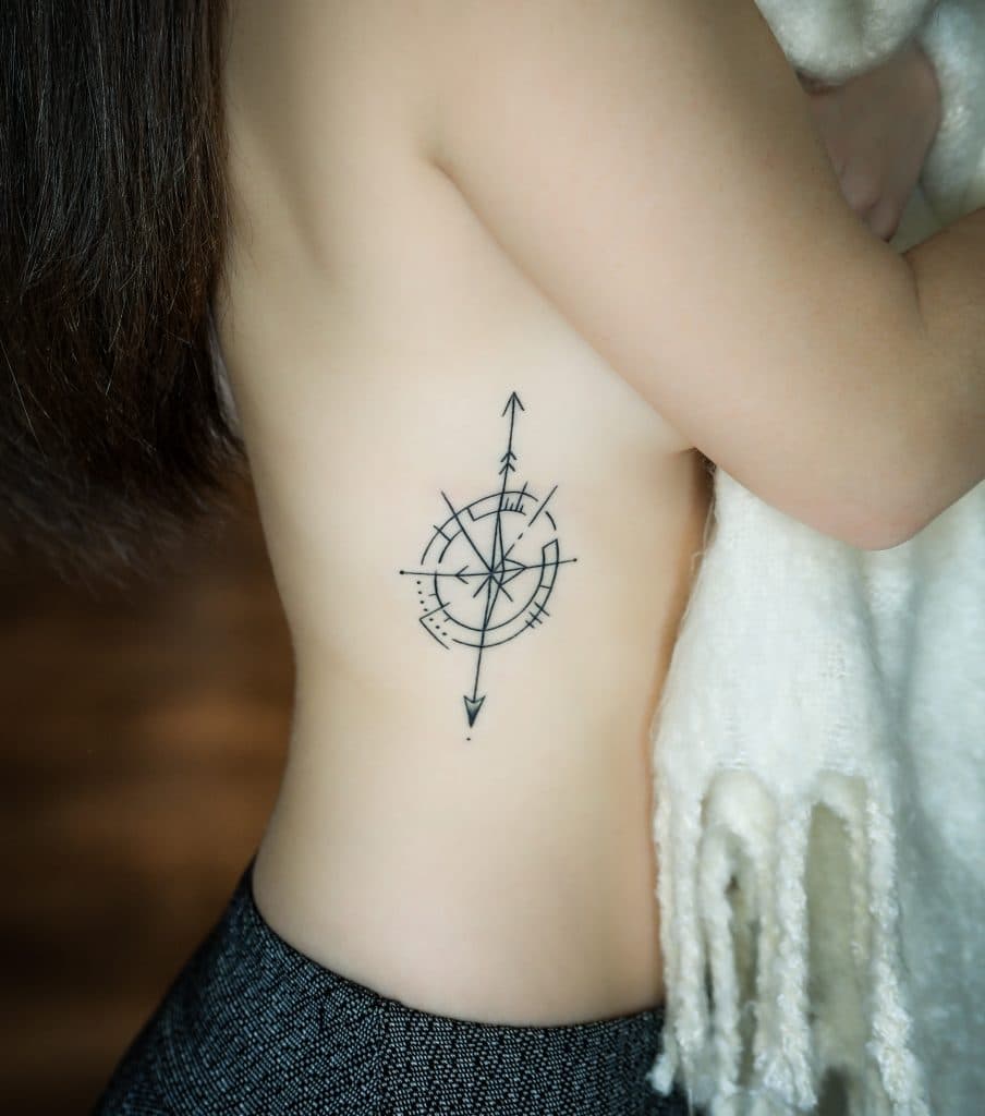 Tattoo of a simple compass on a girl's side. See the most picture perfect moments of 2018. From London to Cape Town to Las Vegas and more, see what you can't miss in these incredible destinations! And for more travel tips and wanderlust inspiration, follow The Scenic Suitcase on Pinterest!