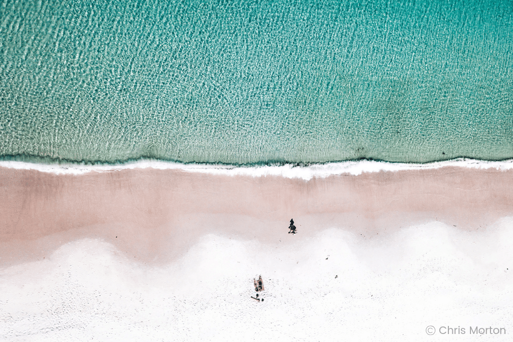 The beach shoreline captured by Chris Morton. Learn incredible tips from expert photographers and a National Geographic editor that will improve your own photos and turn them into stunning masterpieces! And for more tips, follow The Scenic Suitcase on Pinterest!