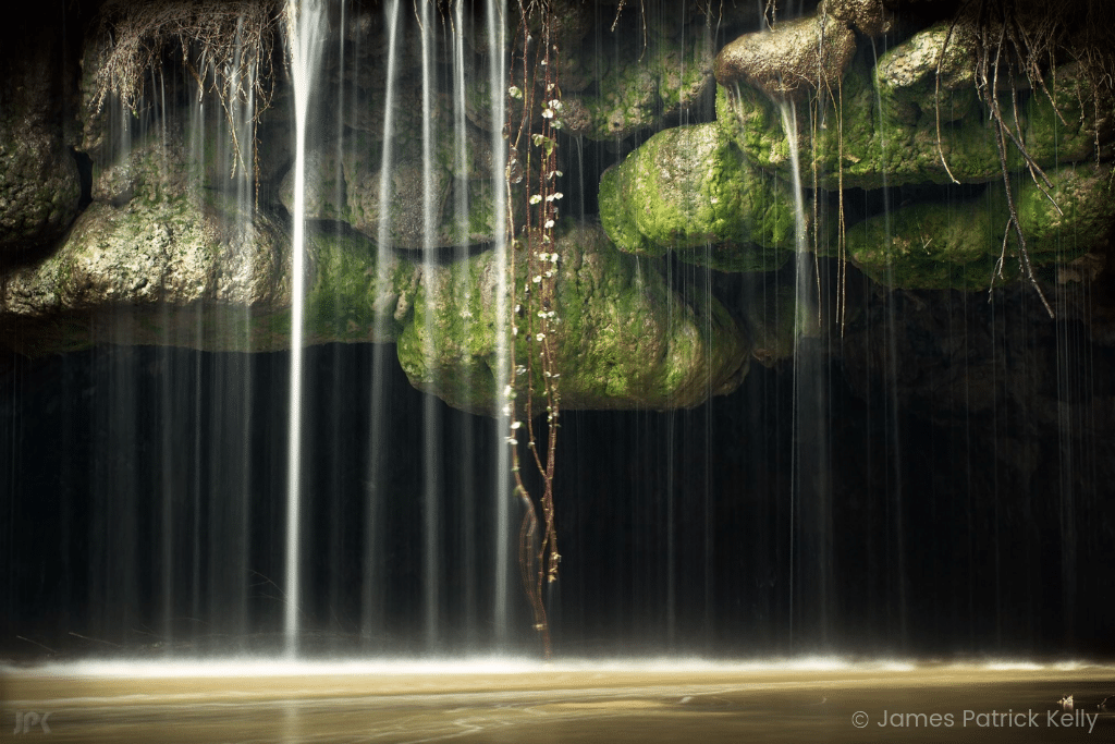 A small mossy waterfall captured by James Patrick Kelly. Learn incredible tips from expert photographers and a National Geographic editor that will improve your own photos and turn them into stunning masterpieces! And for more tips, follow The Scenic Suitcase on Pinterest!
