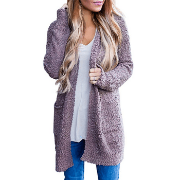 Lavender cardigan. Discover long-haul flight essentials that will make your trip a dream instead of a nightmare. Includes everything you need to enjoy your time in the air! And for more travel tips, follow The Scenic Suitcase on Pinterest!