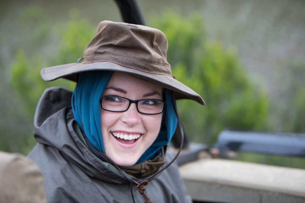 Portrait of a girl laughing. Discover 10 photography ideas to boost your creativity! Get out of the slump and get shooting! And for more tips, follow The Scenic Suitcase on Pinterest! #photographytips #photographyinspiration