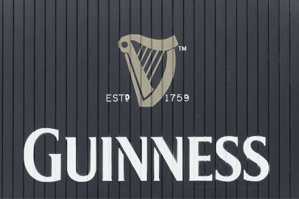 Guinness emblem painted on a building exterior. #GuinnessStorehouse