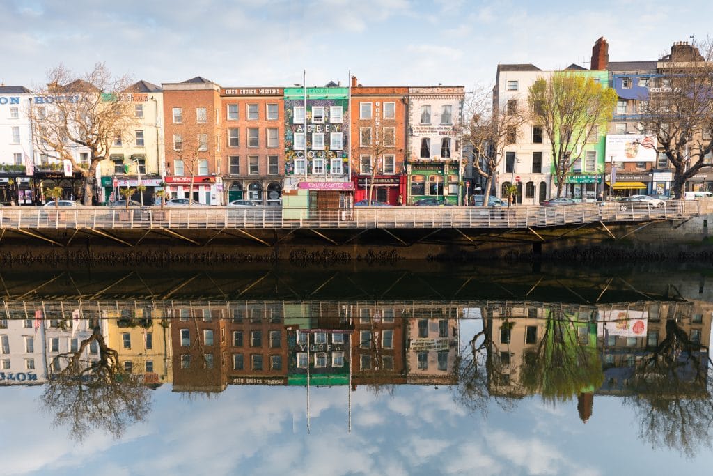Colorful buildings and their reflection in the Liffey River. #LiffeyRiver