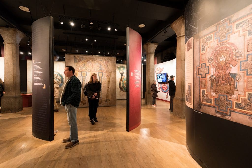 People reading displays in the Book of Kells exhibit. #BookofKells