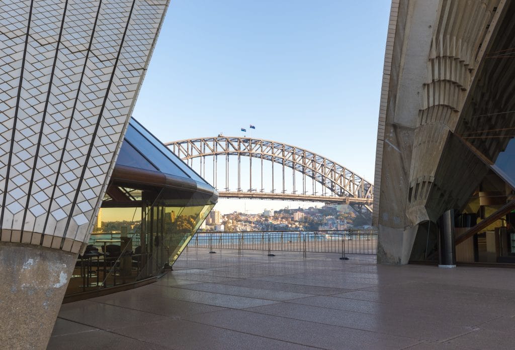 The Sydney Harbour Bridge between a walkway at the Sydney Opera House. #sydney #sydneyoperahouse #sydneyharbourbridge