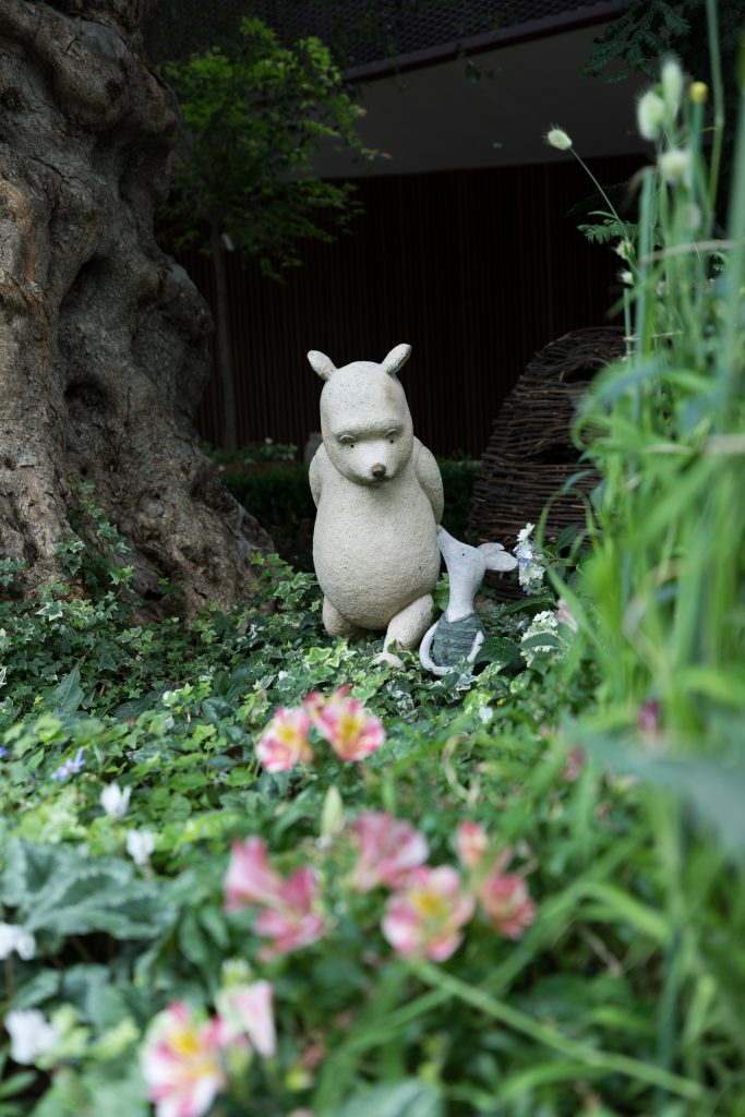 A statue of Winnie the Pooh and Piglet at the Flower Dome in Singapore. #singapore #flowerdome