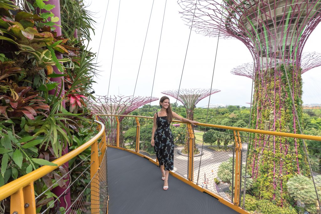 A girl walking along the OCBC Skyway. One of the many reasons to visit Singapore. #singapore #ocbcskyway #supertreegrove
