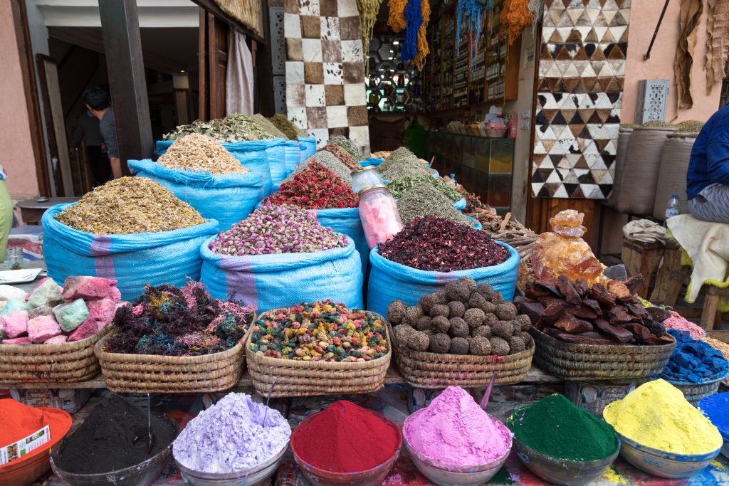 Colorful spices in the Marrakesh souk. Discover the many alluring reasons to visit Marrakesh, Morocco. From must-see sights to can't-miss experiences, here's the very best of Marrakesh! #marrakesh #souk