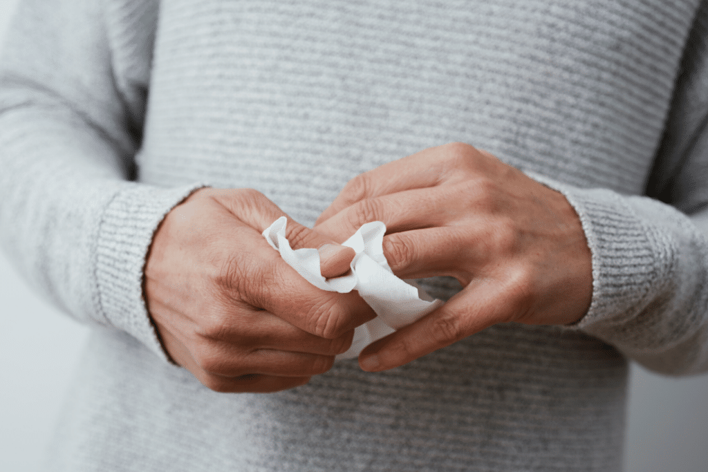 Person wiping their hands with wet wipes. #travelhealth
