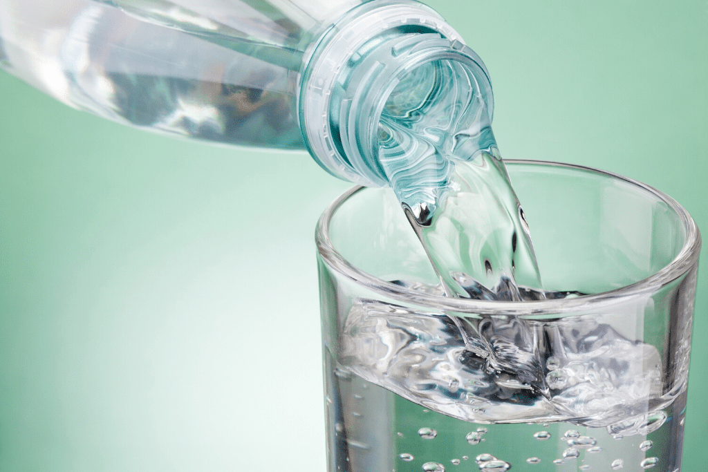 Water being poured into a glass.