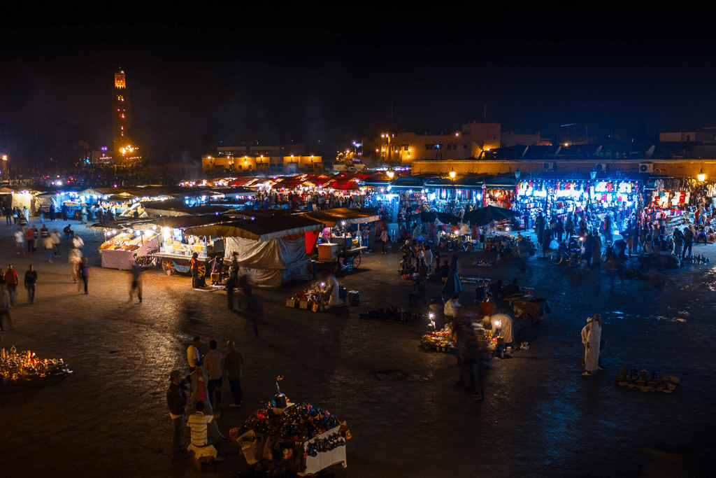 The (somwhat seedy) medina at night. Learn the things you need to know before visiting Marrakesh! #thingstoknowbeforevisitingmarrakesh