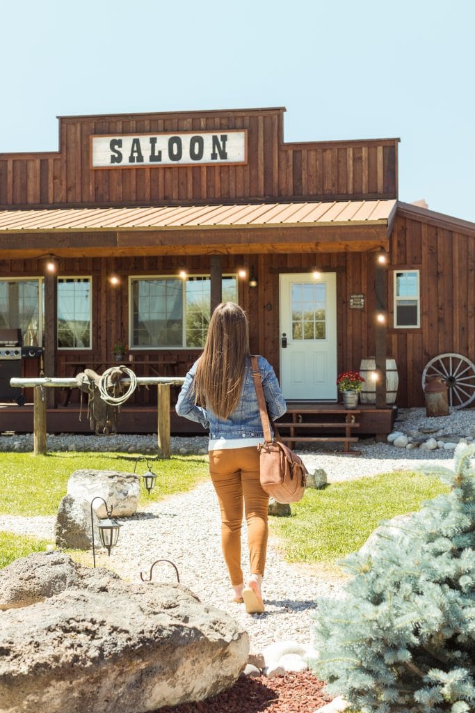 A girl walking towards the saloon at Maison Tetonia.
