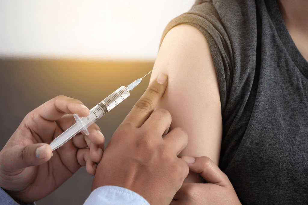 Someone receiving a vaccine. 