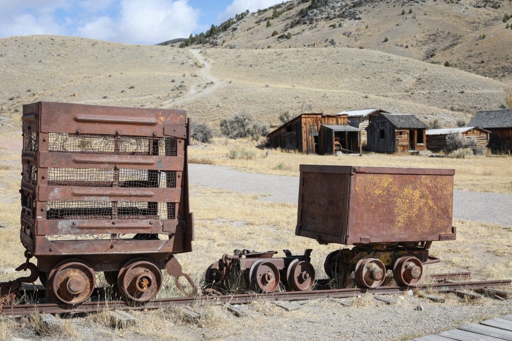 Rail cars once filled with gold in the ghost town in Bannack Montana.
