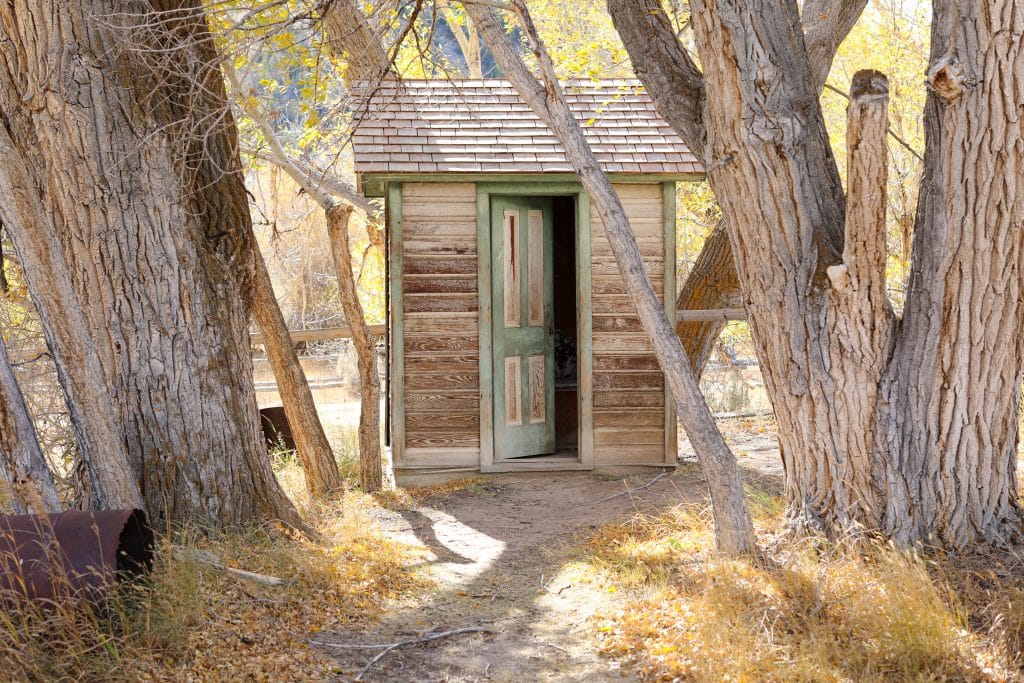 An old wooden outhouse in Bannack, Montana.