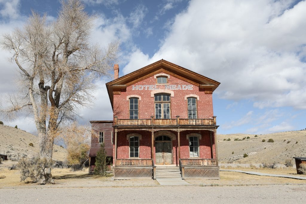 The brick facade of the Hotel Meade in Bannack, Montana.