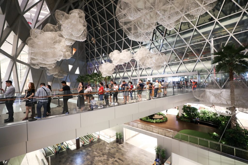 A walkway with sculptures in the Changi airport. #changiairport #singaporeairport