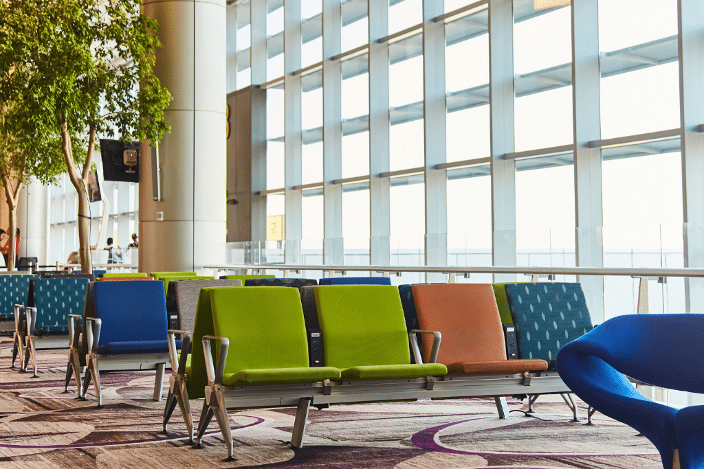 A waiting area with colorful chairs in Singapore's Changi Airport.