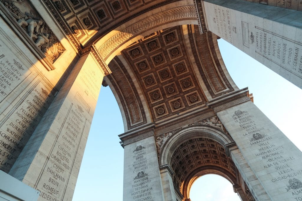 Looking up at the stone carvings inside the Arc de Triomphe.