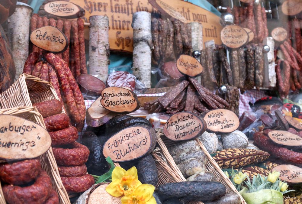 Meats in a shop window. Discover why Rothenburg ob der Tauber in Germany is a must for your fairytale bucket list (and what you can't miss while you're there!)