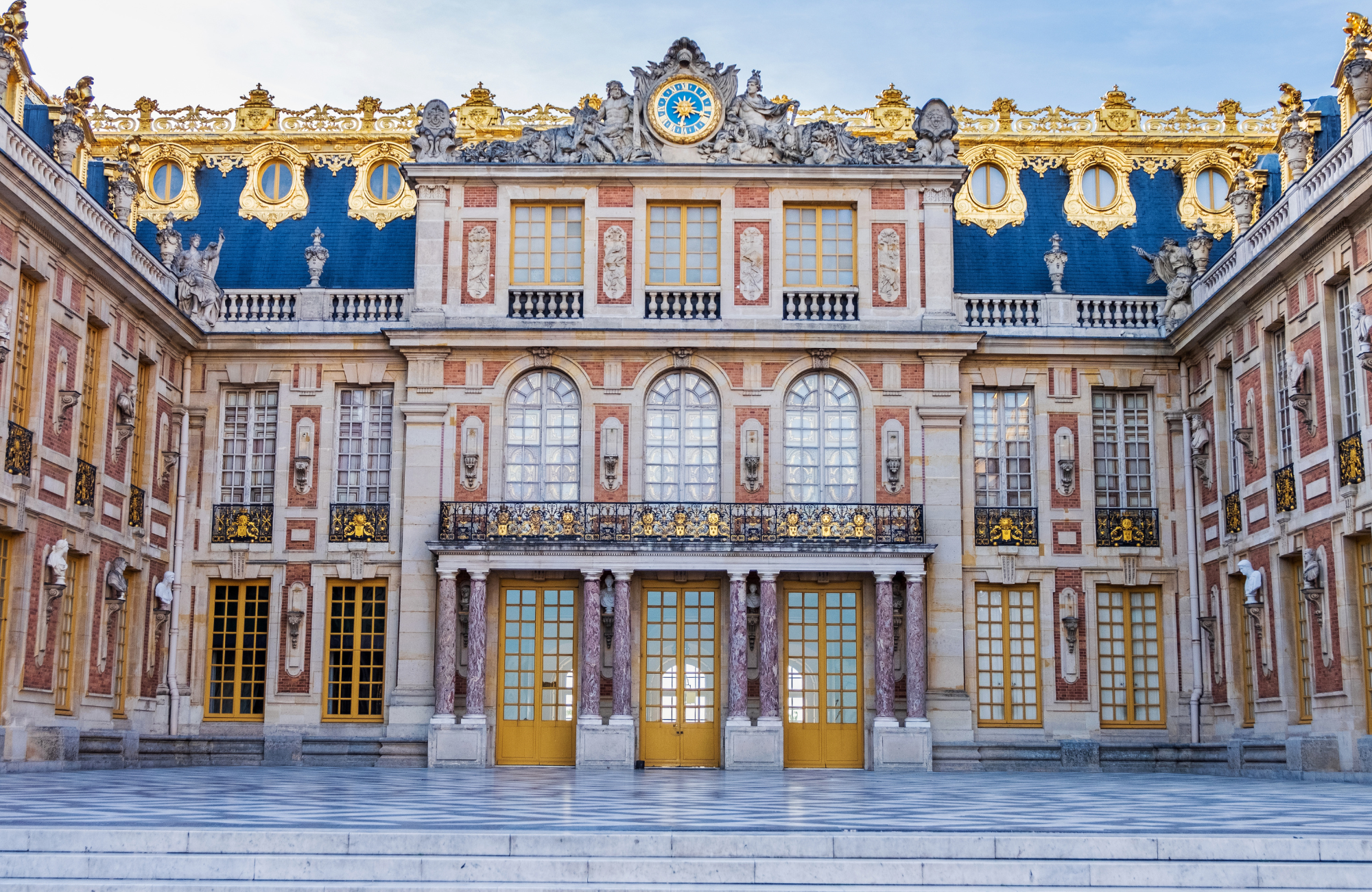 The guilded entry to the Palace of Versailles.