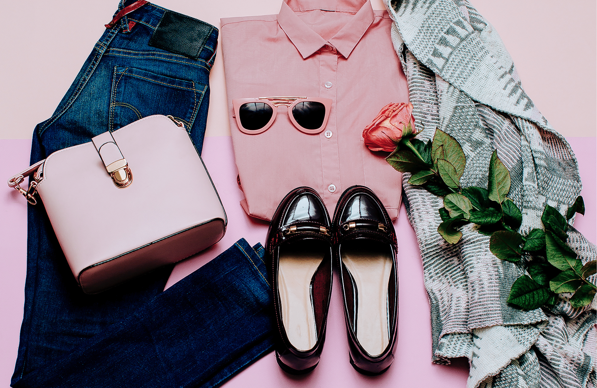 Overhead shot of an outfit with pink accents.