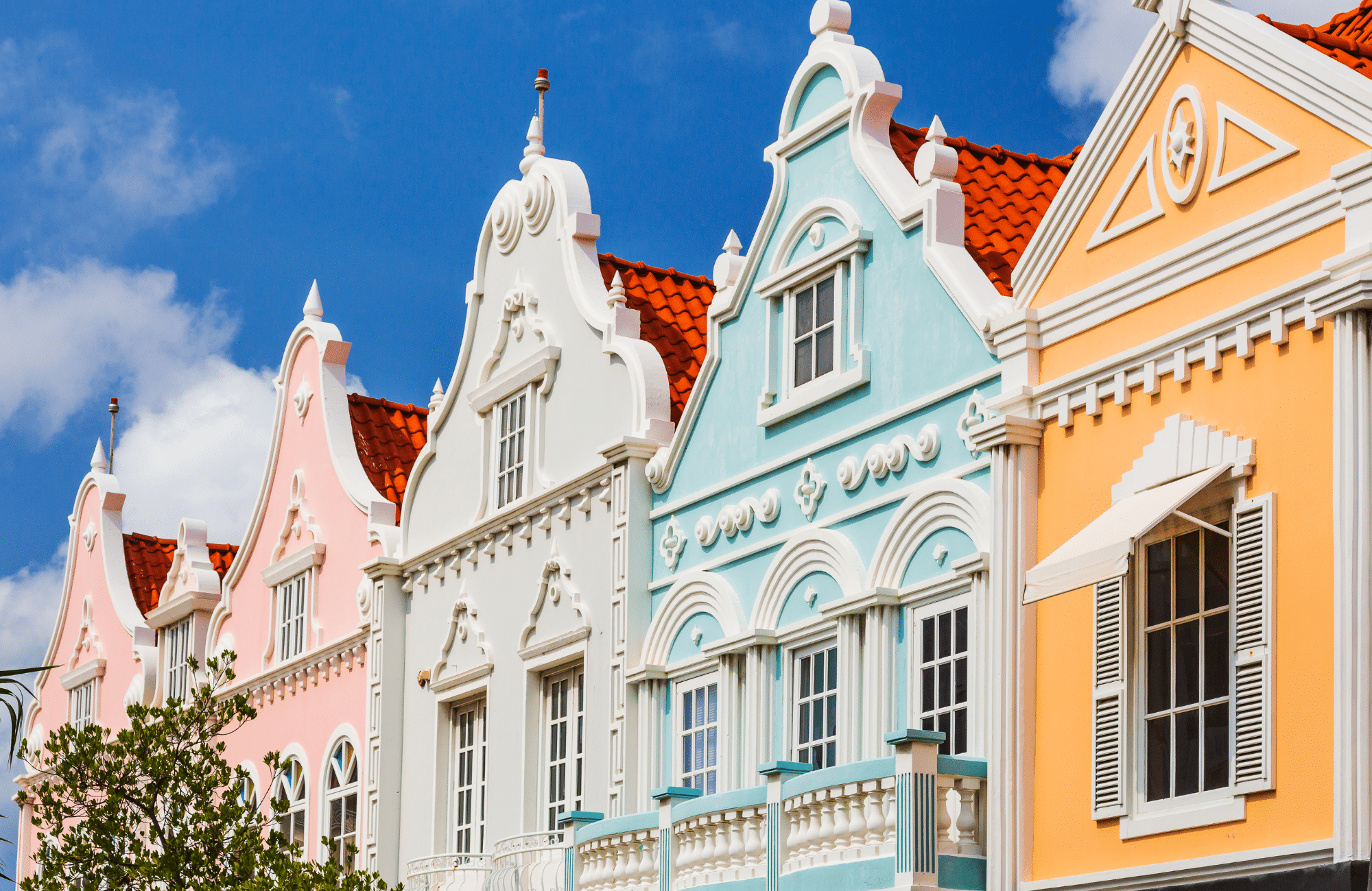Colorful Dutch colonial architecture storefronts.